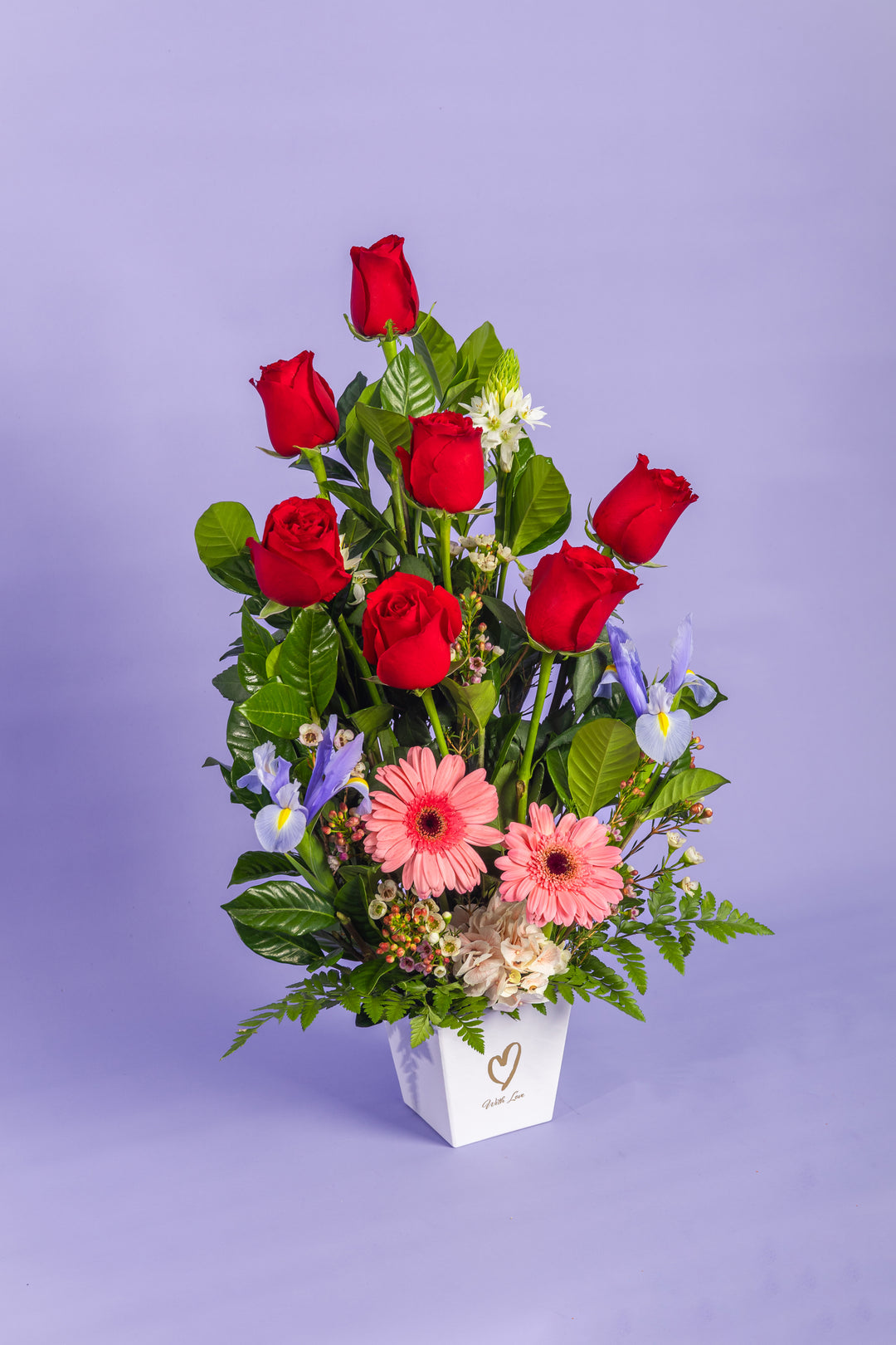 Arreglo de 7 rosas con 2 gerberas