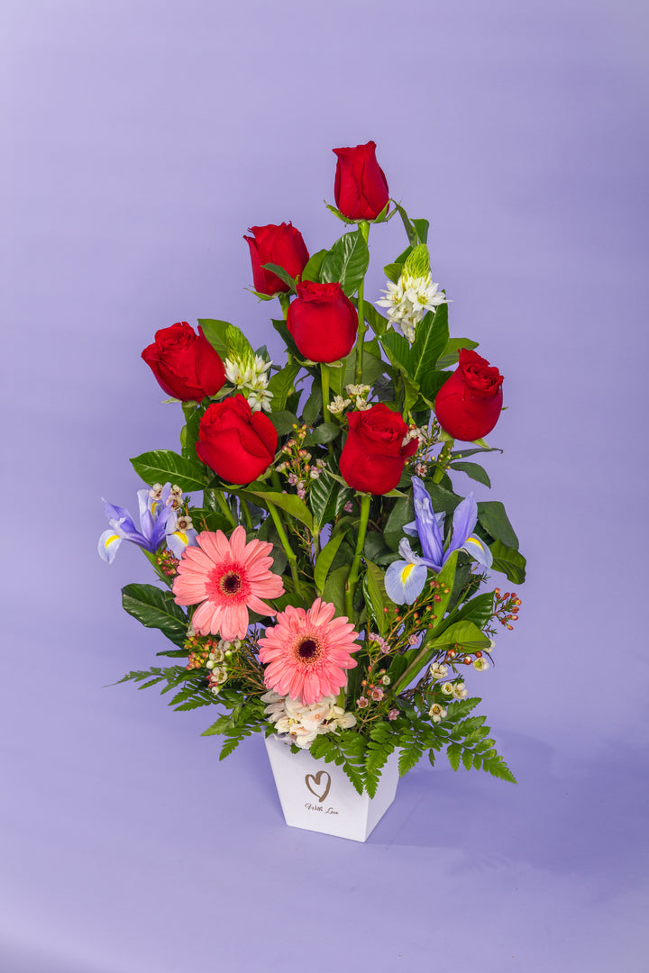 Arreglo de 7 rosas con 2 gerberas