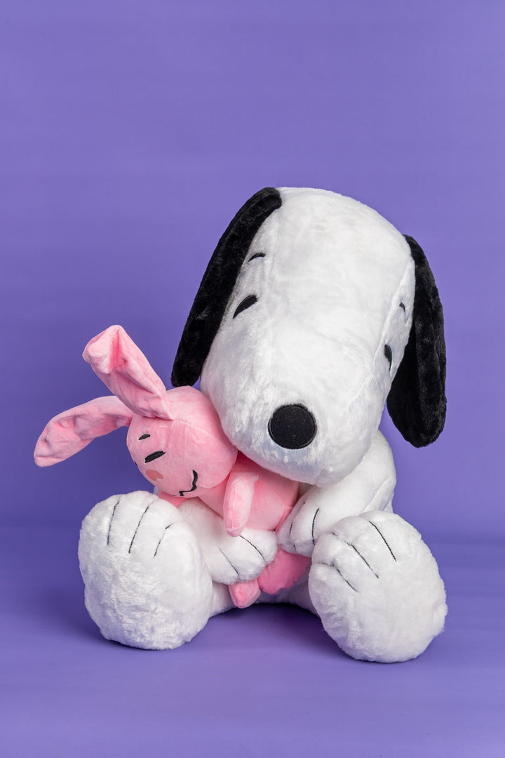 Snoppy con peluche rosado