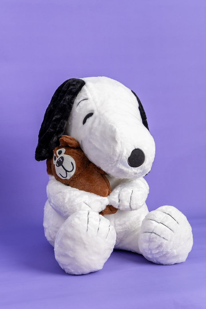 Snoopy con peluche de oso