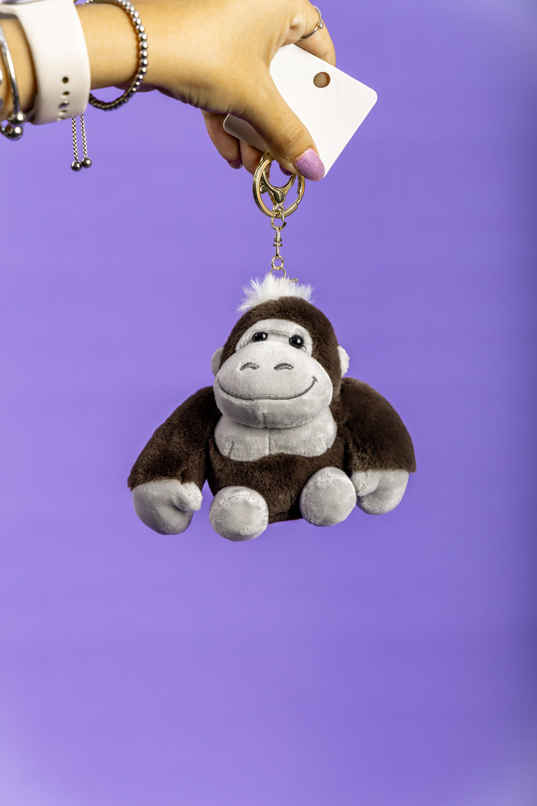 Llavero de monito marrón