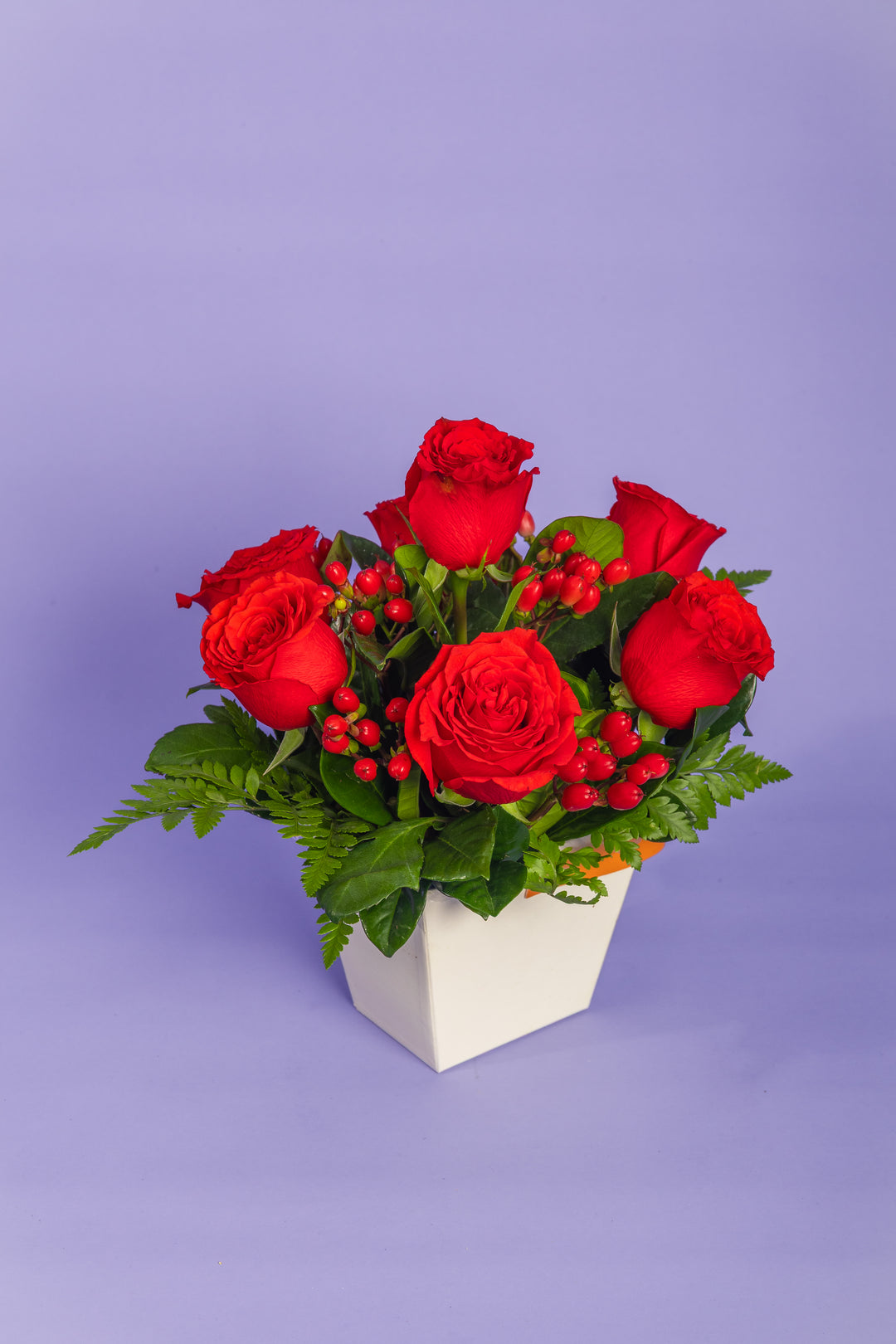 Mini box de 7 rosas rojas
