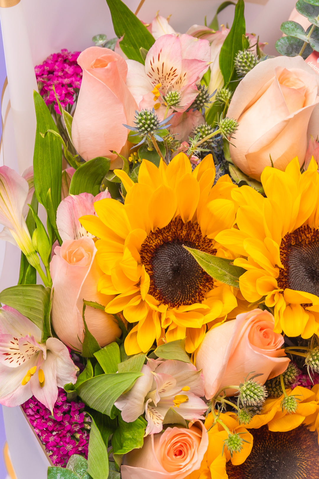Ramo de girasoles con rosas